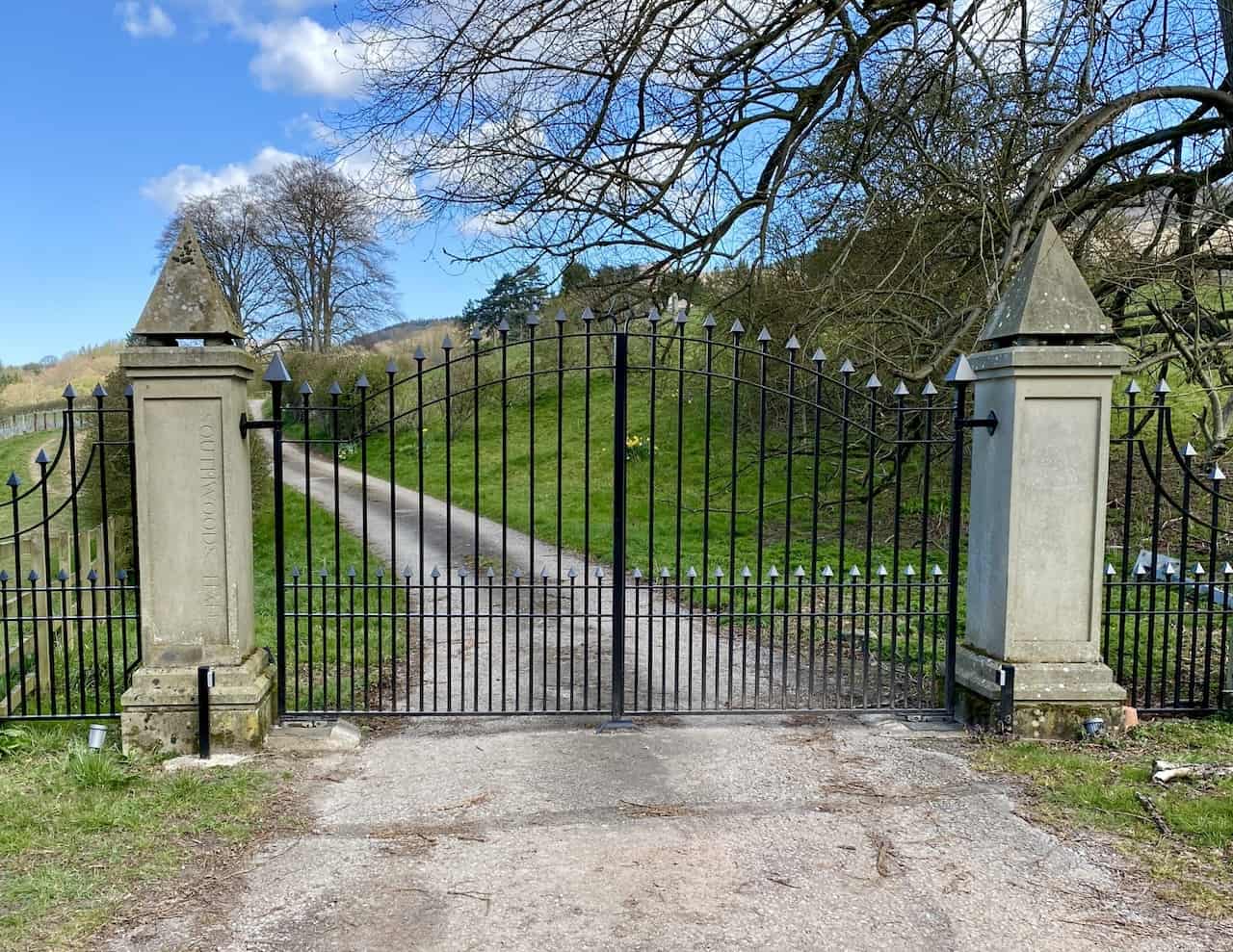 The charming gated entrance of Southwoods Hall, steeped in history and character.