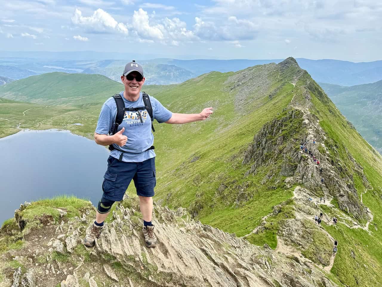 As we near the top, Jeff points out our route across Striding Edge. Easier paths below the ridge’s top offer an alternative for those seeking a less challenging route.