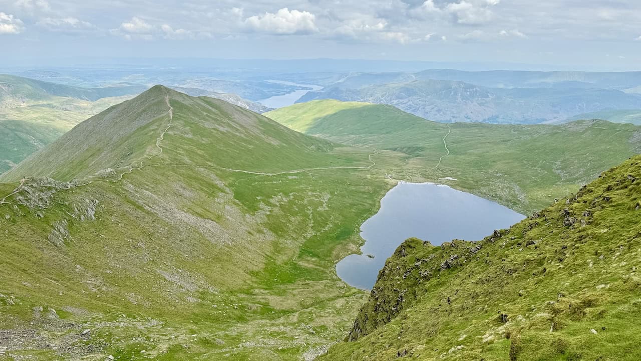 Another view from Helvellyn’s summit features the serene Red Tarn and the striking Catstye Cam.
