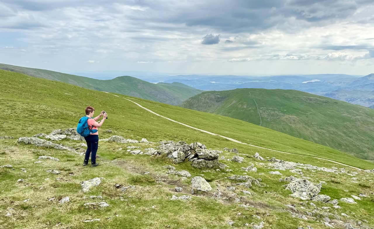 Sandra captures pictures of the Lake District from Dollywaggon Pike’s summit. From here, you can see Morecambe Bay in the distance, as well as Coniston Water and Esthwaite Water.