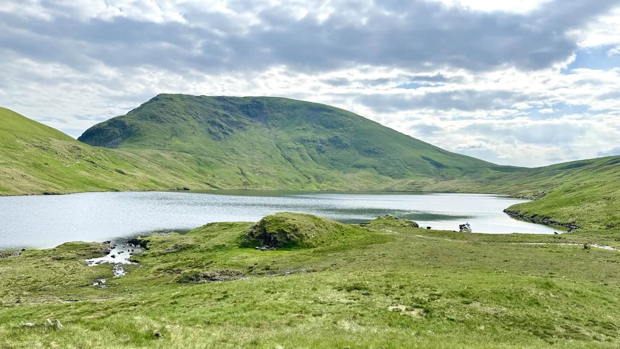The beautiful Grisedale Tarn backed by Seat Sandal is a serene sight, providing a peaceful interlude.
