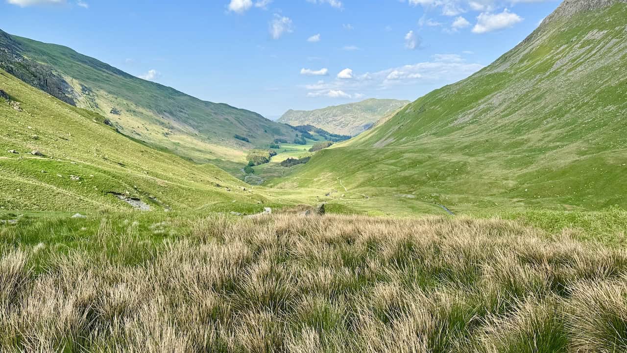The view north-east through the Grisedale Beck valley is enchanting, offering a tranquil retreat.