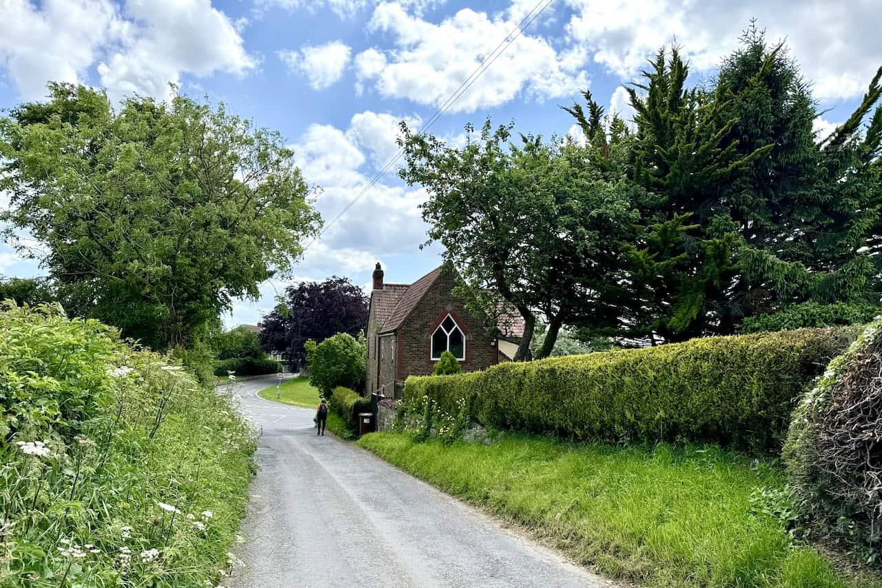 We follow Outgang Lane, a minor road leading back to the A170 main road on the east side of Thornton-le-Dale. Just before reaching the road, we turn right onto Church Lane.