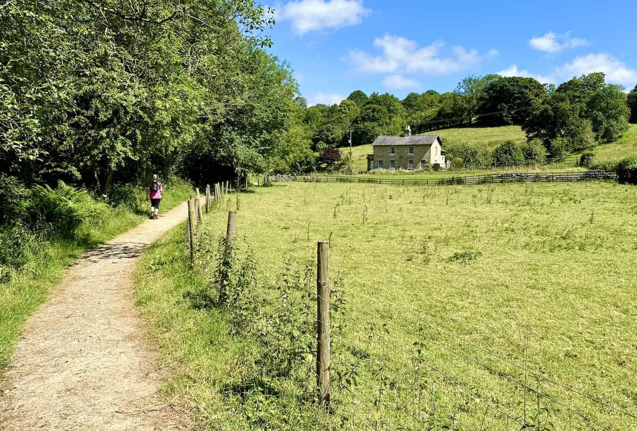 After more walking through woodland with steps and small inclines, Intake Cottage comes into view during the Goathland walk.
