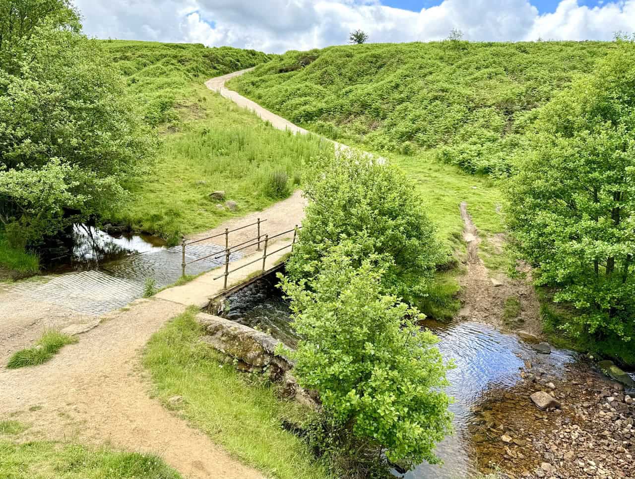 This is the footbridge and ford known as the Sheepwash near the northern end of Cod Beck Reservoir. The name possibly derives from shepherds bringing their sheep down from the surrounding moorland and washing them in the beck at the ford. The ford across Cod Beck was on an old drovers' road between Scotland and the south of England, known as the Hambleton Drove Road. For this Osmotherley walk, I cross the bridge and continue up the track in the photo.