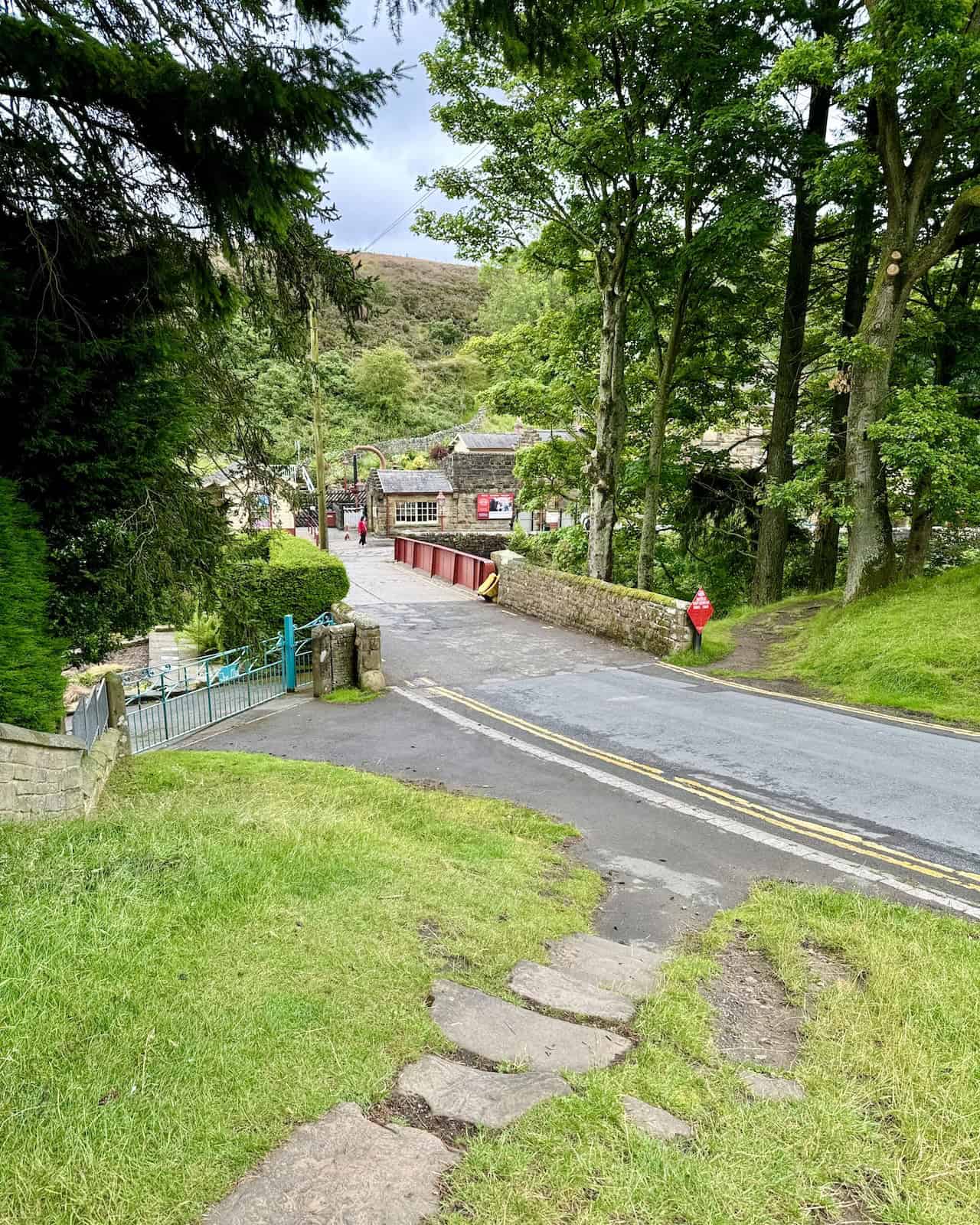 View of the road and steps leading to Goathland Railway Station. A fantastic place to explore before continuing the Goathland to Grosmont walk.