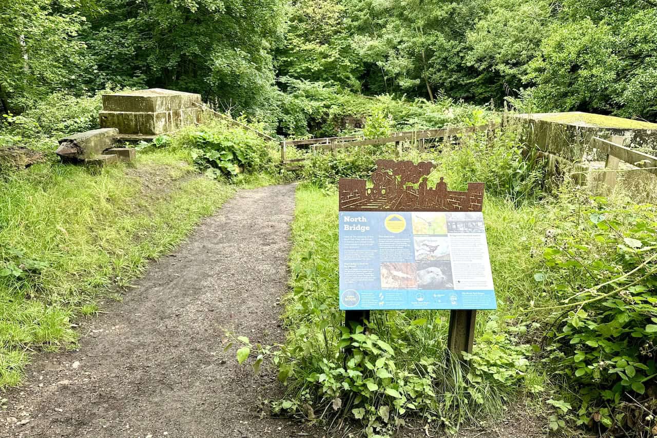 North Bridge at the crossing of the Murk Esk river, showing remnants of the Victorian railway age. Despite its brown peaty colour, the water quality is high, supporting significant wildlife habitats. This bridge is part of the Goathland to Grosmont walk.