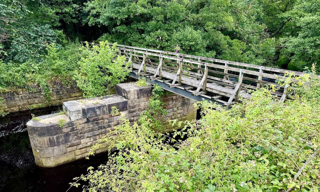 Footbridge at the halfway point of the Rail Trail between Goathland and Grosmont, originally used to carry the railway line.