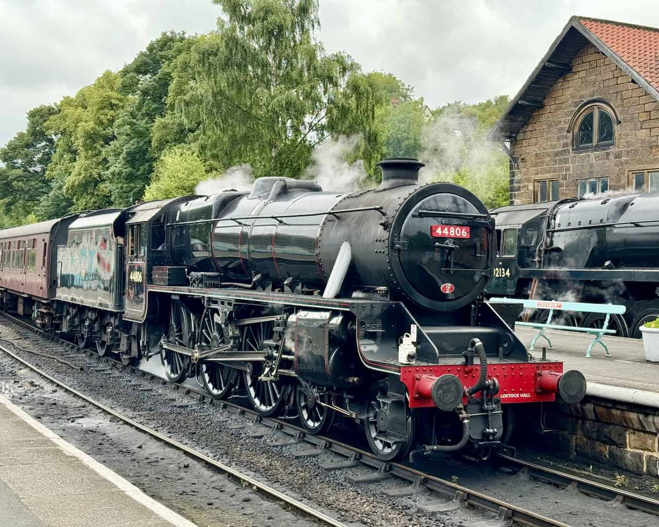Steam locomotive 44806, known as 'Kenneth Aldcroft,' at Grosmont Railway Station. Built in 1944, the locomotive has a rich history and was overhauled to ensure its continued operation. This is a highlight of my Goathland to Grosmont walk.