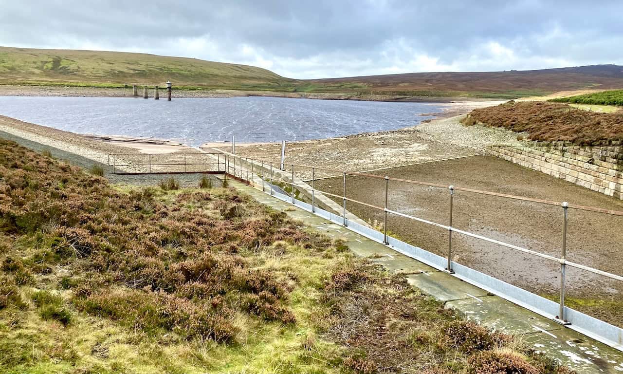 Upper Barden Reservoir in a remote and open countryside, surrounded by expansive and untouched landscape.