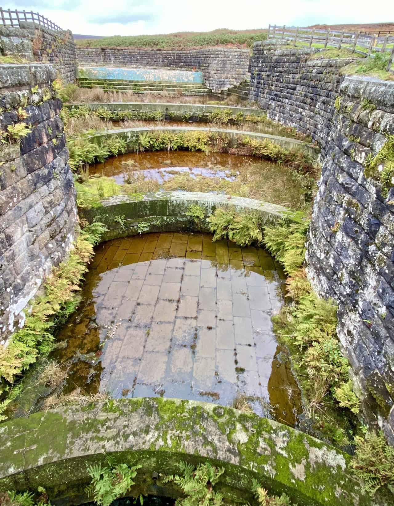 Interesting weirs at the northern end of the Upper Barden Reservoir dam, adding intrigue to the surroundings.