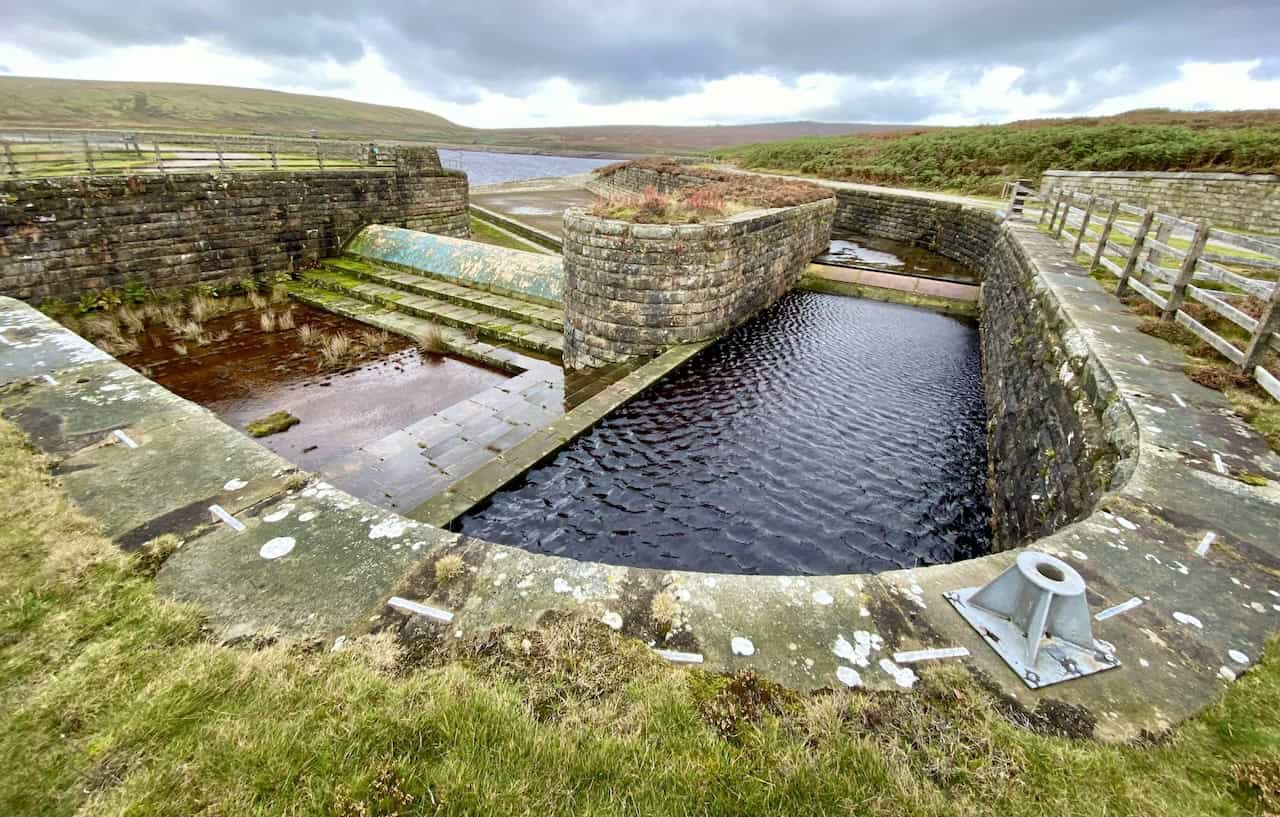 Interesting weirs at the northern end of the Upper Barden Reservoir dam, adding intrigue to the surroundings.