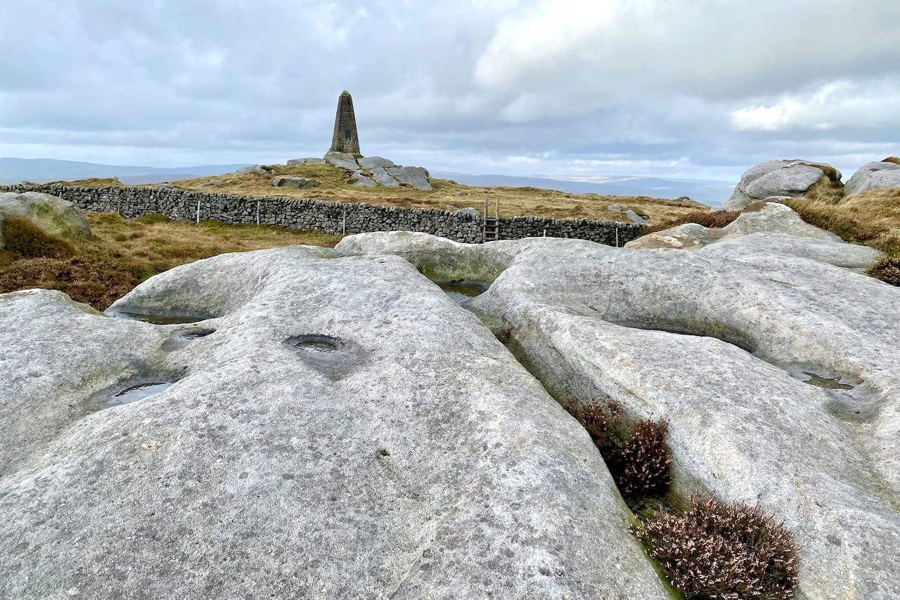 Cracoe War Memorial on the summit of Cracoe Fell, standing 7.2 metres high and overlooking the villages of Cracoe and Rylstone.