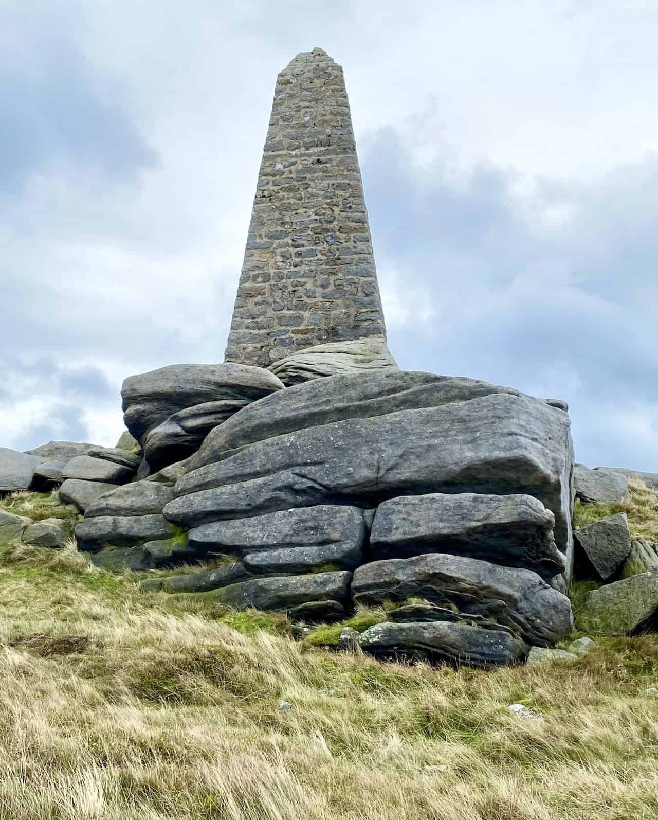 Cracoe War Memorial on the summit of Cracoe Fell, standing 7.2 metres high and overlooking the villages of Cracoe and Rylstone.