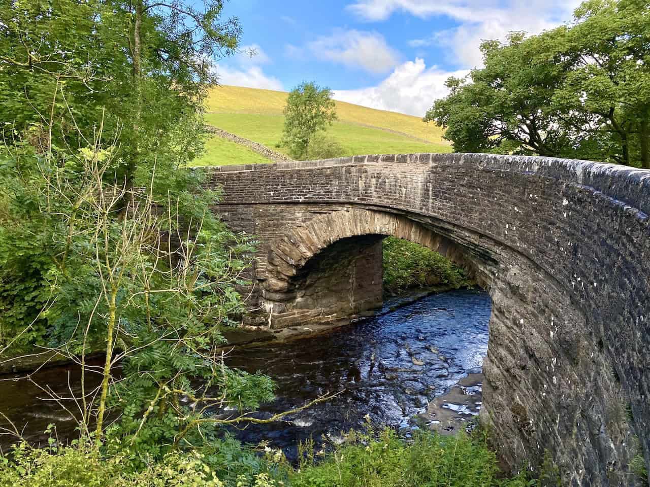 Stone House Bridge over the River Dee, marking a point of transition on the Dentdale walk.