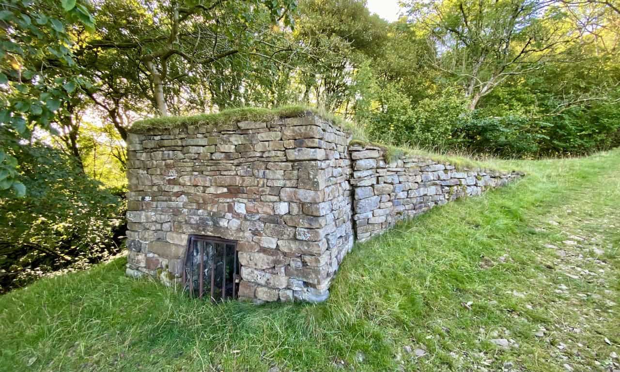 A recently excavated lime kiln opposite the barn at High Ground Farmstead, used historically by Yorkshire Dales farmers for producing quicklime.