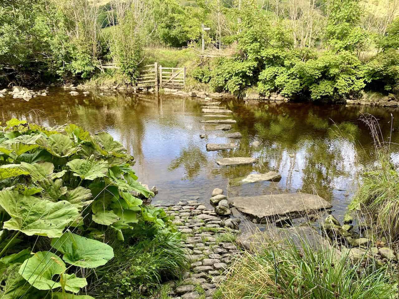 Stepping stones on the River Dee in Dentdale, about a mile east of Dent village, passed during the Great Coum walk.
