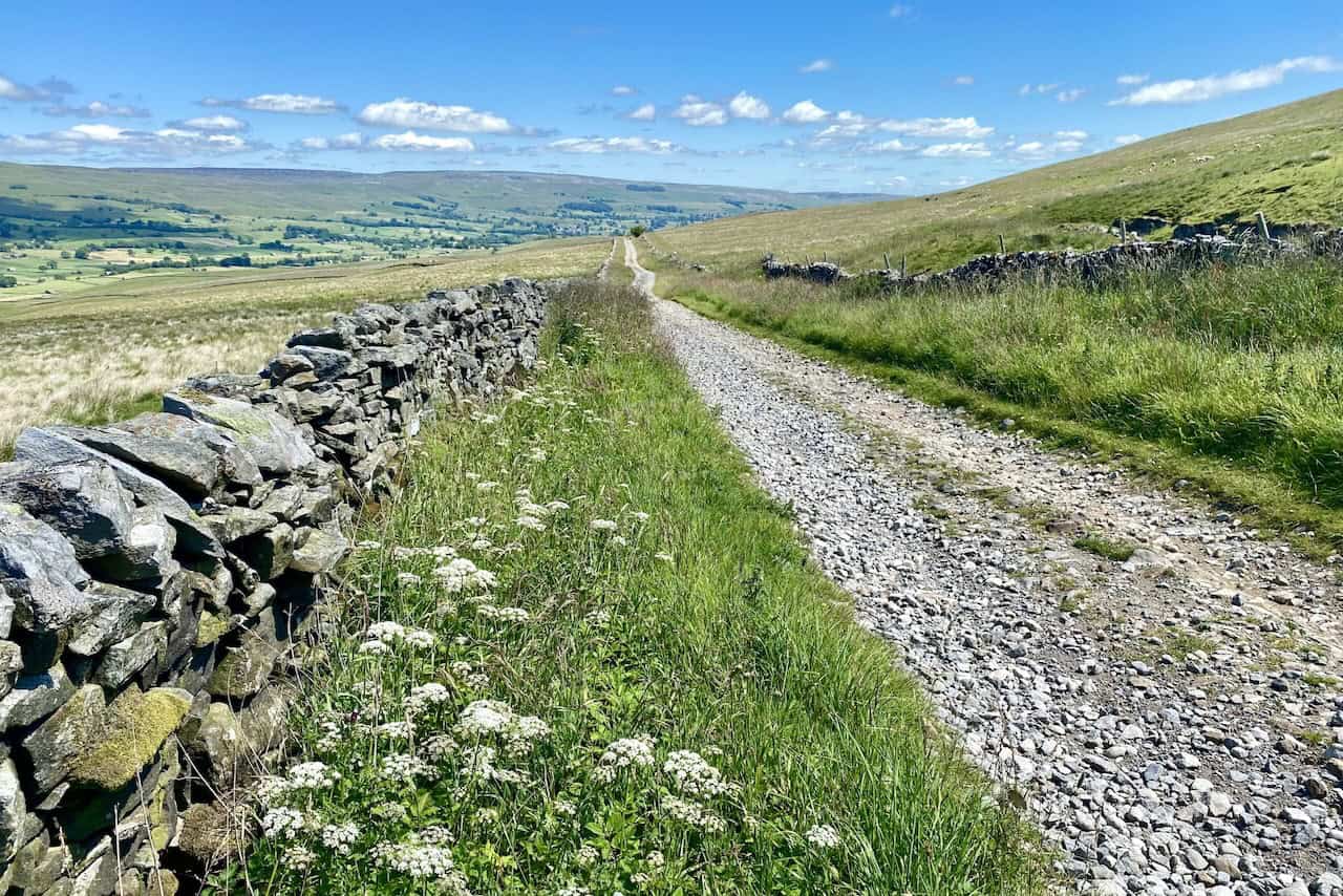 Cam High Road, an old Roman road, covered in loose stones but offering downhill walking and spectacular views.