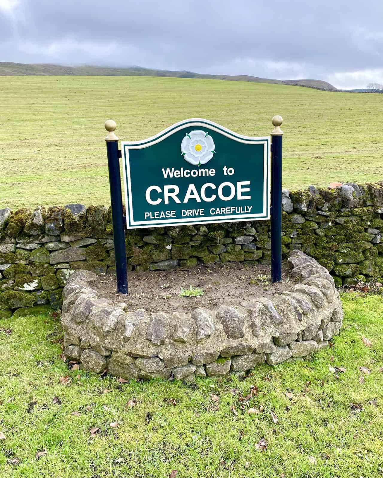 A roadside sign at the north-eastern end of Cracoe village.