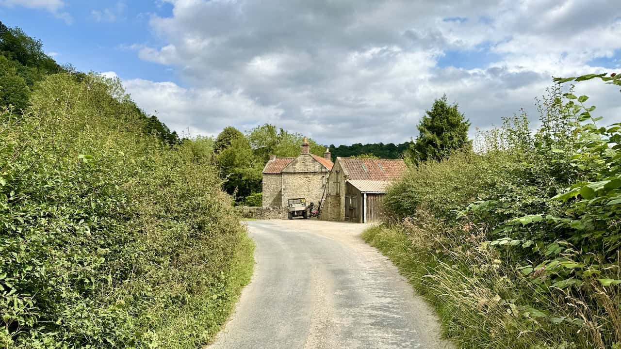 Approaching Hagg Hall, a farm, along the road.
