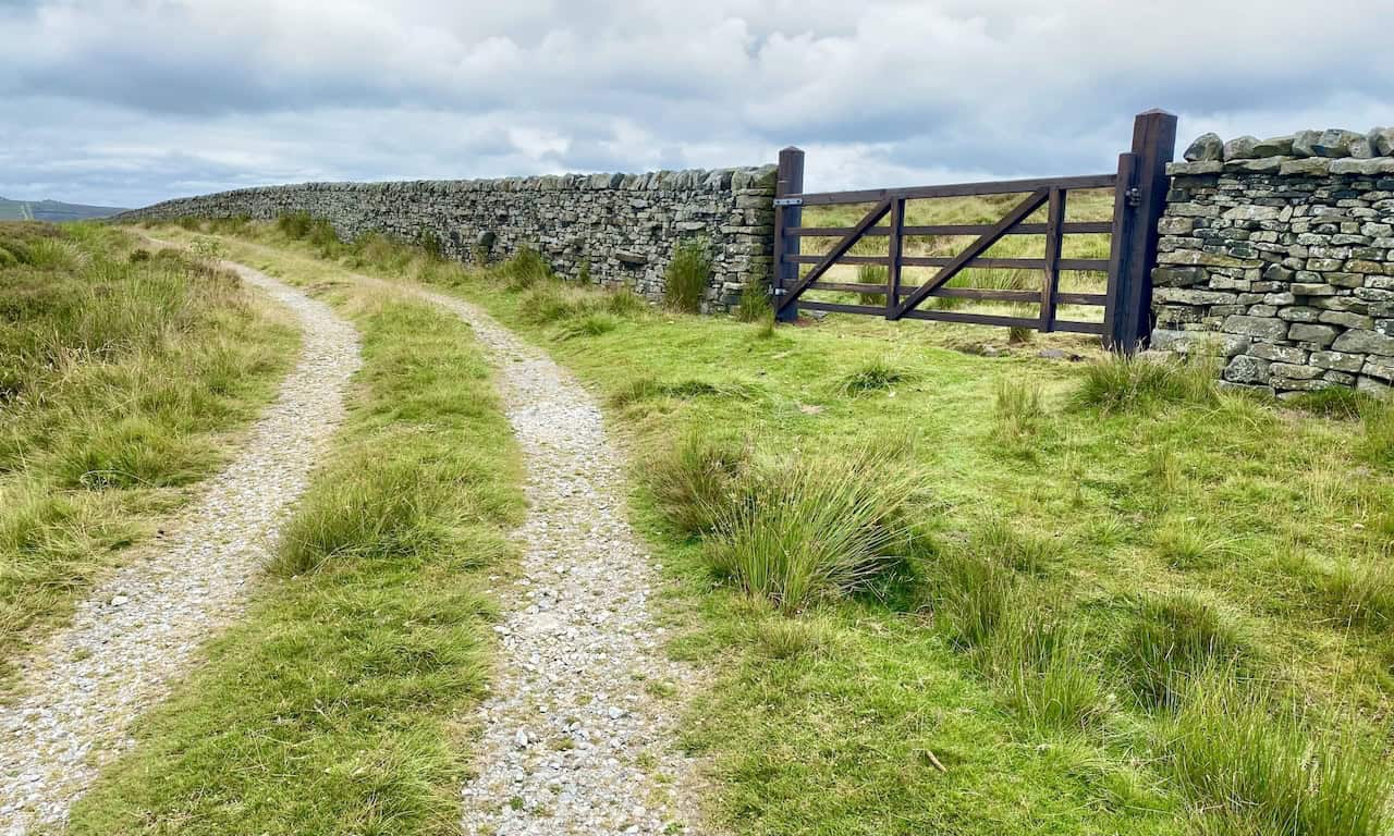 We embark on a north-westerly path that hugs a dry stone wall, leading us directly to Lord’s Seat, a significant point in our Simon's Seat walk.