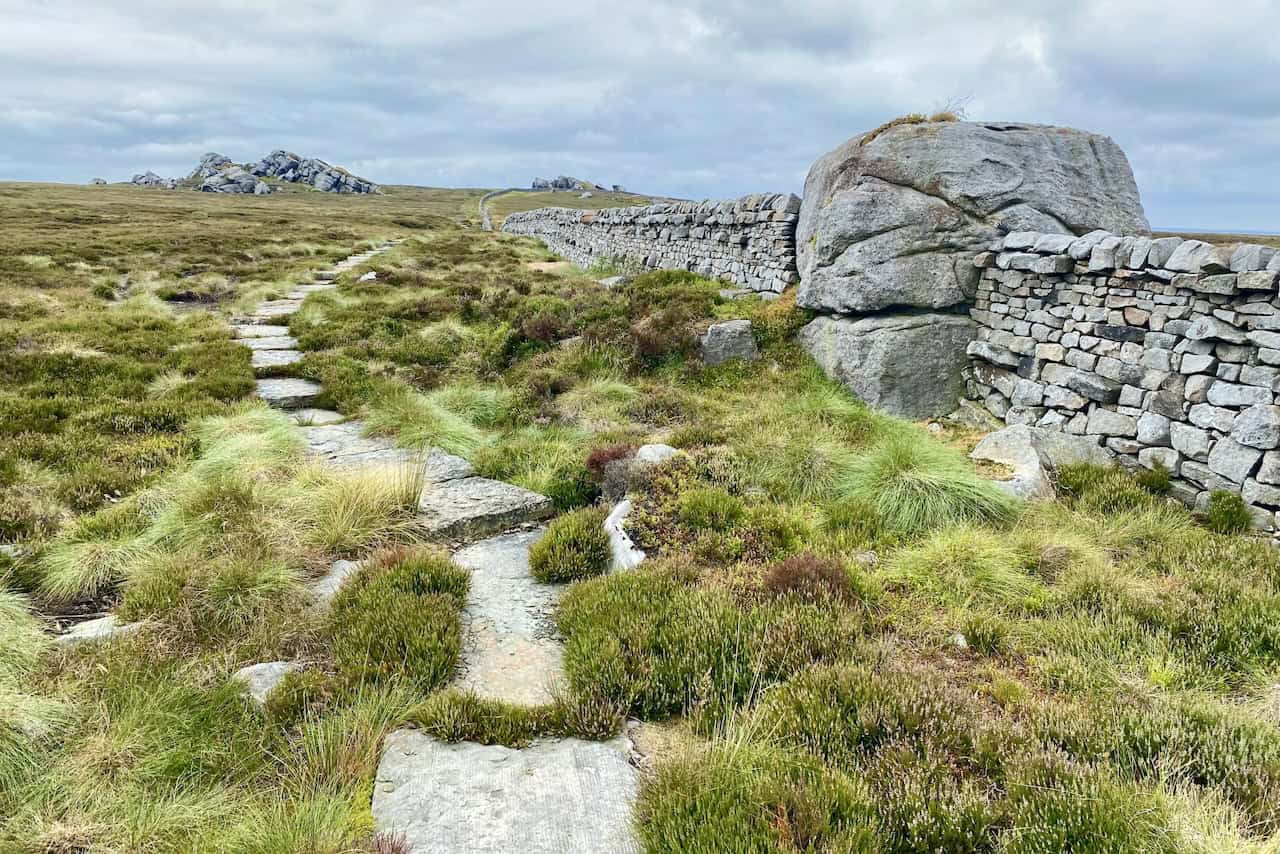 As we approach Lord’s Seat, we follow a flagged path east of Hen Stones, making the ascent smoother and more enjoyable.