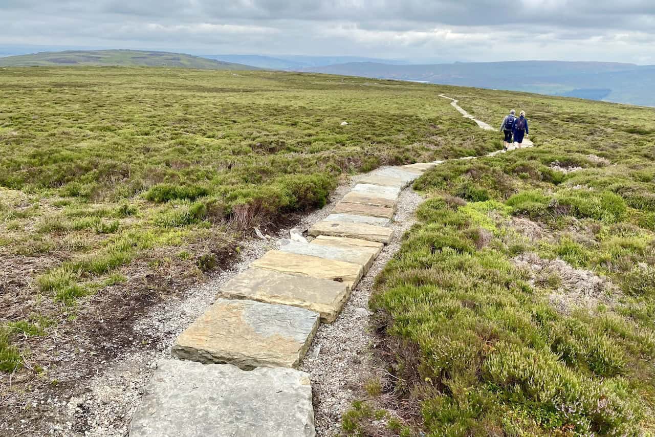 The path between Simon’s Seat and Flask Brow is well maintained and recently laid, easing our progress across the moorland.