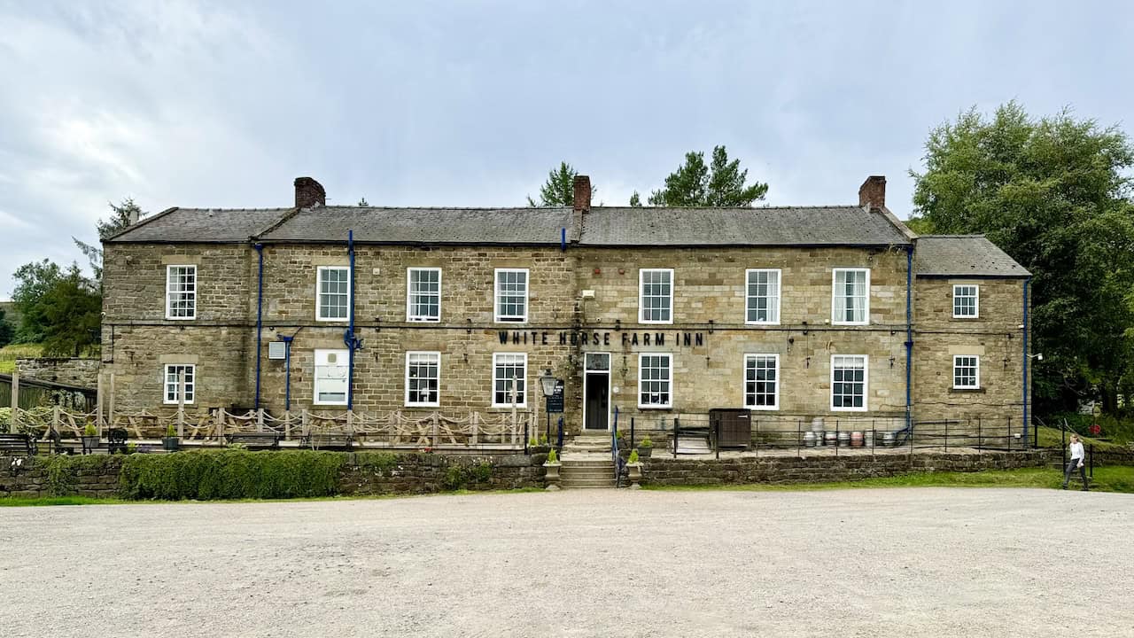 View of the 16th-century White Horse Farm Inn on Gill Lane during the Rosedale Abbey walk.
