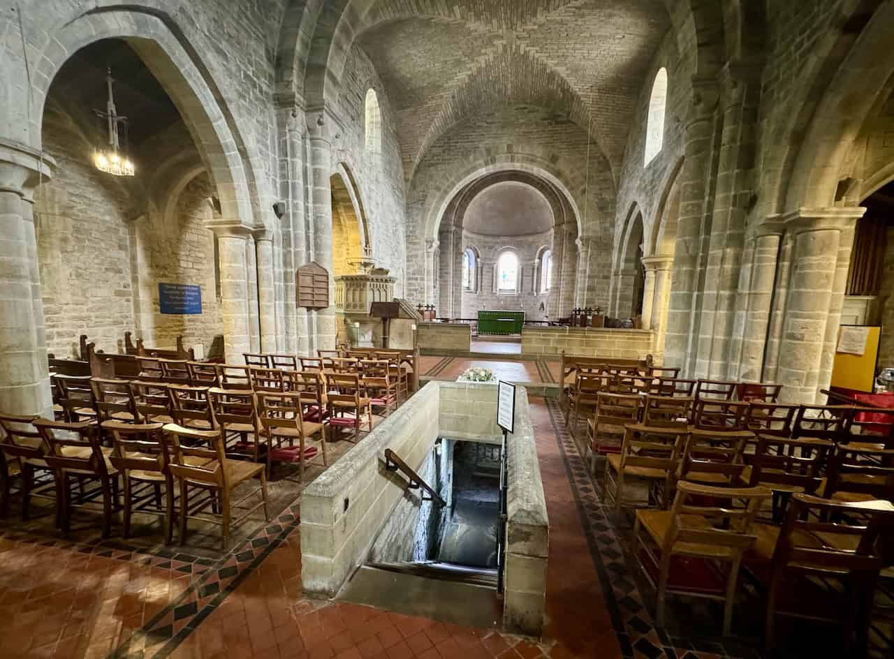 Interior of the Church of St Mary in Lastingham, featuring Romanesque architecture dating from the 11th century.
