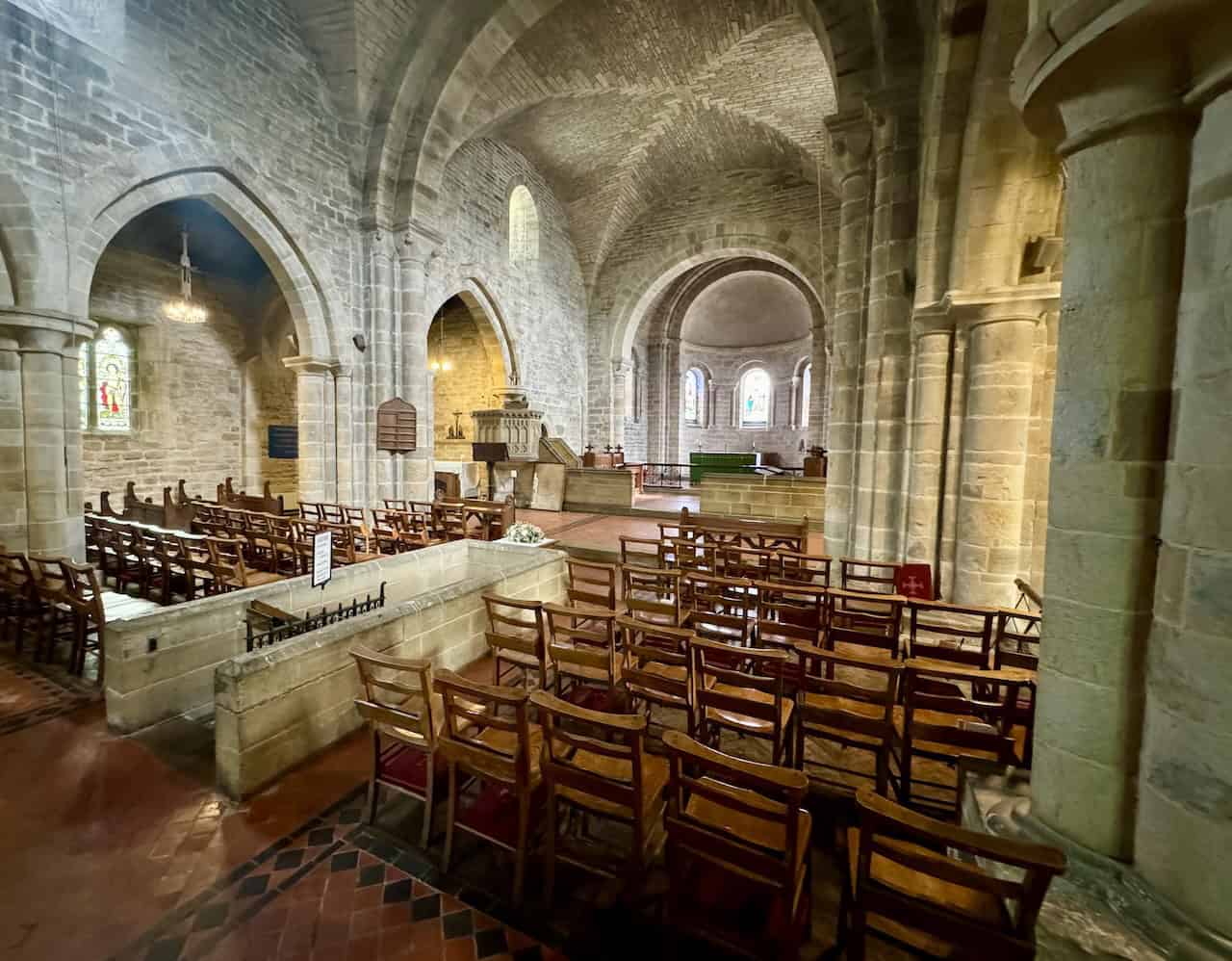 Interior of the Church of St Mary in Lastingham, featuring Romanesque architecture dating from the 11th century.
